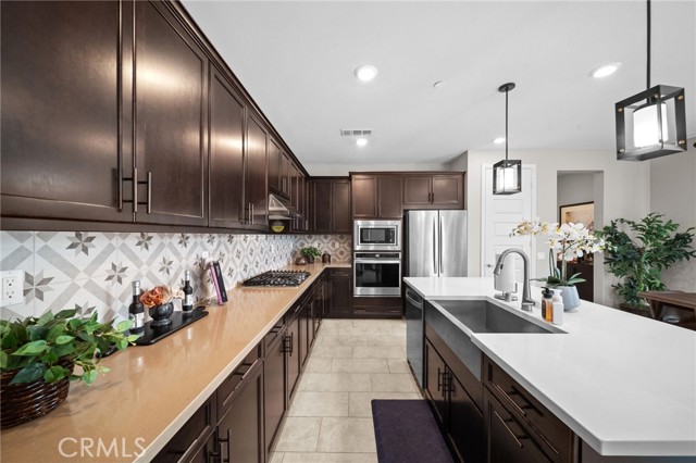 Beautiful tile backsplash and stainless steel appliances