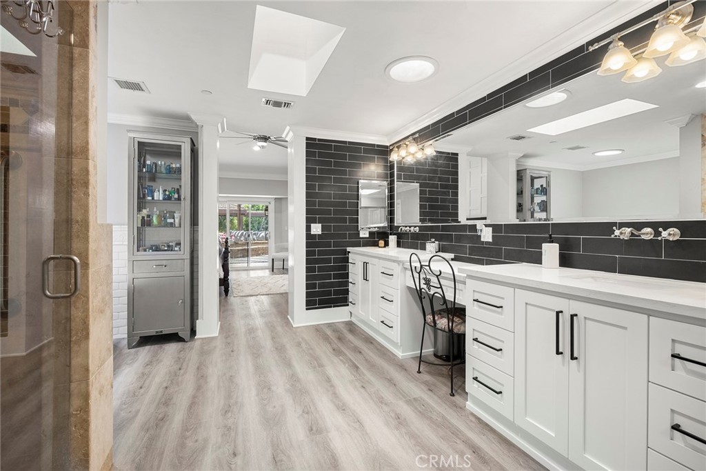 Primary bathroom recently remodeled with Quartz Counters & Custom Cabinets