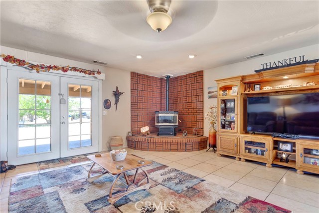 High efficiency pellet stove with blowers. While the home has central heat, the current owners utilize only this pellet stove for heat.