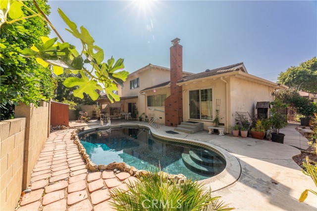 View of pool and side yard
