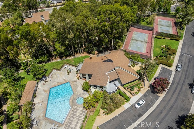 Aerial view of club house, tennis courts and pool.