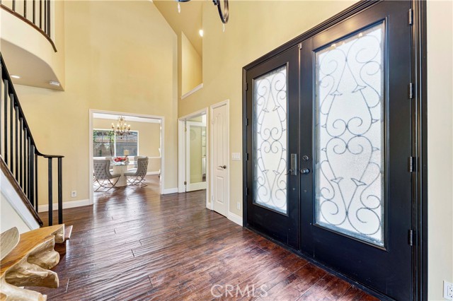 Entrance area with double iron door & high ceiling