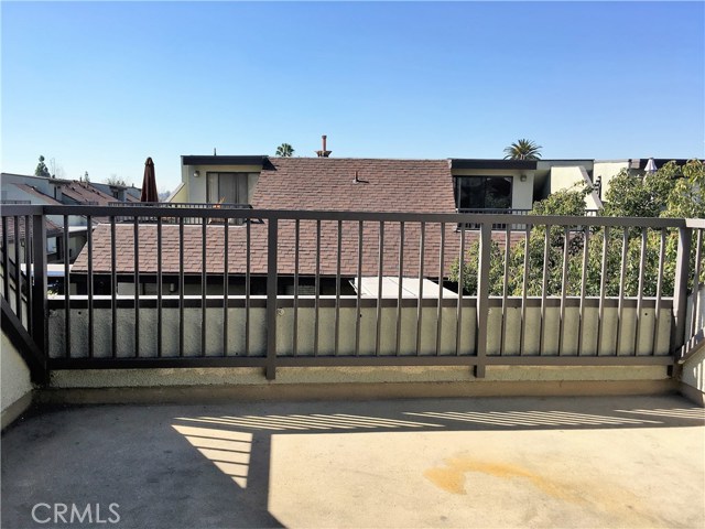 Large deck with peek-a-boo mountain and city hall views