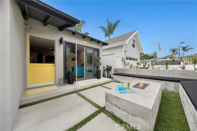 Firepit and seating in gated front yard