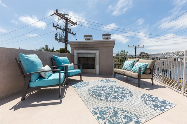 Roof top deck with gas fireplace and room to entertain