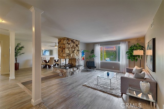 Beautiful single-story home nestled in the desirable neighborhood of Placentia bordering Yorba Linda. This spectacular home has lots of special features that you’ve been looking for, new laminate flooring, remodeled kitchen, sprawling front lawn and a private backyard. The spacious well thought out floor plan offers a living room and dining room separated by a classic double-sided stone fireplace. The kitchen features a cozy breakfast nook, ample cabinet space, including an island and granite countertops, recessed lighting and two food pantries. Just off the kitchen is the laundry room with large storage cabinets above and half bathroom with a service door to the back yard. The large family room offers plenty of room for entertaining. Spacious master bedroom and bathroom with ample closet space and slider doors to the back yard. Three great sized bedrooms with large closets. One bedroom has white built-in cabinets and desk area, perfect for an office. Direct access two car garage has built in shelves for storage. Private relaxing backyard with lush greenery has areas for dining, lounging & gathering. Great back yard for the kids to play. All this and close to restaurants and shopping. The home is located in the award-winning Placentia Linda school district with walking distance to Van Buren Elementary. ALL OFFERS WILL BE REVIEWED MID DAY ON 3/17/2020 Beautiful single-story home nestled in the desirable neighborhood of Placentia bordering Yorba Linda. This spectacular home has lots of special features that you’ve been looking for, new laminate flooring, remodeled kitchen, sprawling front lawn and a private backyard. The spacious well thought out floor plan offers a living room and dining room separated by a classic double-sided stone fireplace. The kitchen features a cozy breakfast nook, ample cabinet space, including an island and granite countertops, recessed lighting and two food pantries. Just off the kitchen is the laundry room with large storage cabinets above and half bathroom with a service door to the back yard. The large family room offers plenty of room for entertaining. Spacious master bedroom and bathroom with ample closet space and slider doors to the back yard. Three great sized bedrooms with large closets. One bedroom has white built-in cabinets and desk area, perfect for an office. Direct access two car garage has built in shelves for storage. Private relaxing backyard with lush greenery has areas for dining, lounging & gathering. Great back yard for the kids to play. All this and close to restaurants and shopping. The home is located in the award-winning Placentia Linda school district with walking distance to Van Buren Elementary. ALL OFFERS WILL BE REVIEWED MID DAY ON 3/17/2020