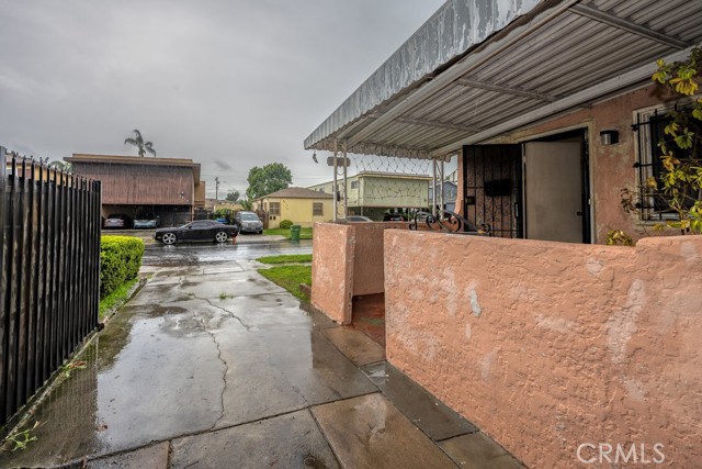 driveway and covered porch entrance to home