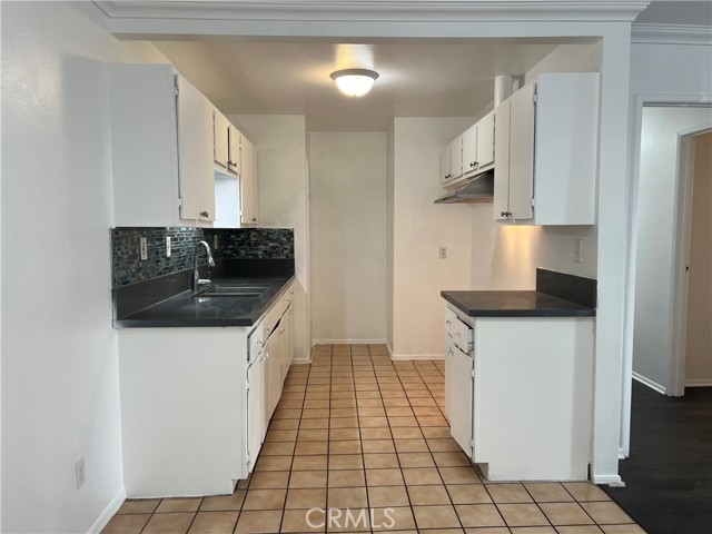9122 S Hoover Street, Los Angeles CA: https://media.crmls.org/medias/cc782b90-5364-4a9c-a682-dcf3763e1159.jpg