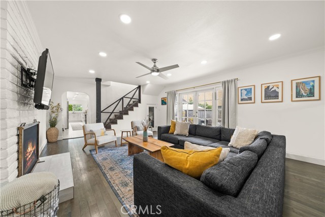 Family room with fireplace and french doors to backyard