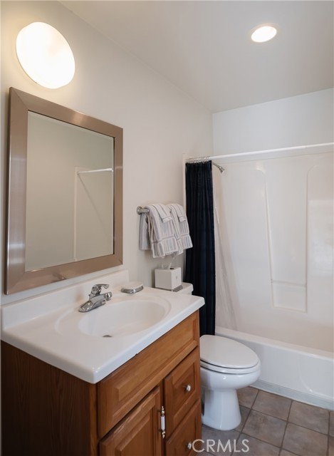 Bathroom off guest quarters above garage