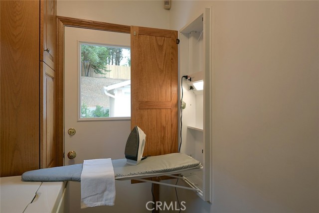 Ironing station with rotating board