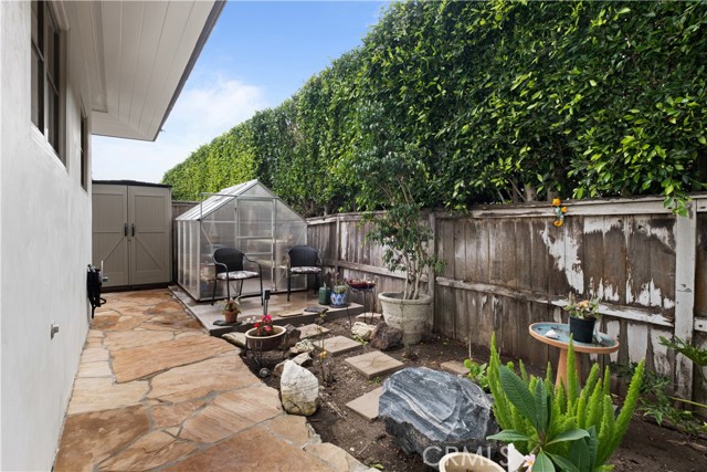 Greenhouse and Shed at back of property