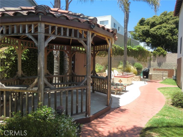 Back Yard with Gazebo, Fire Table & Grill