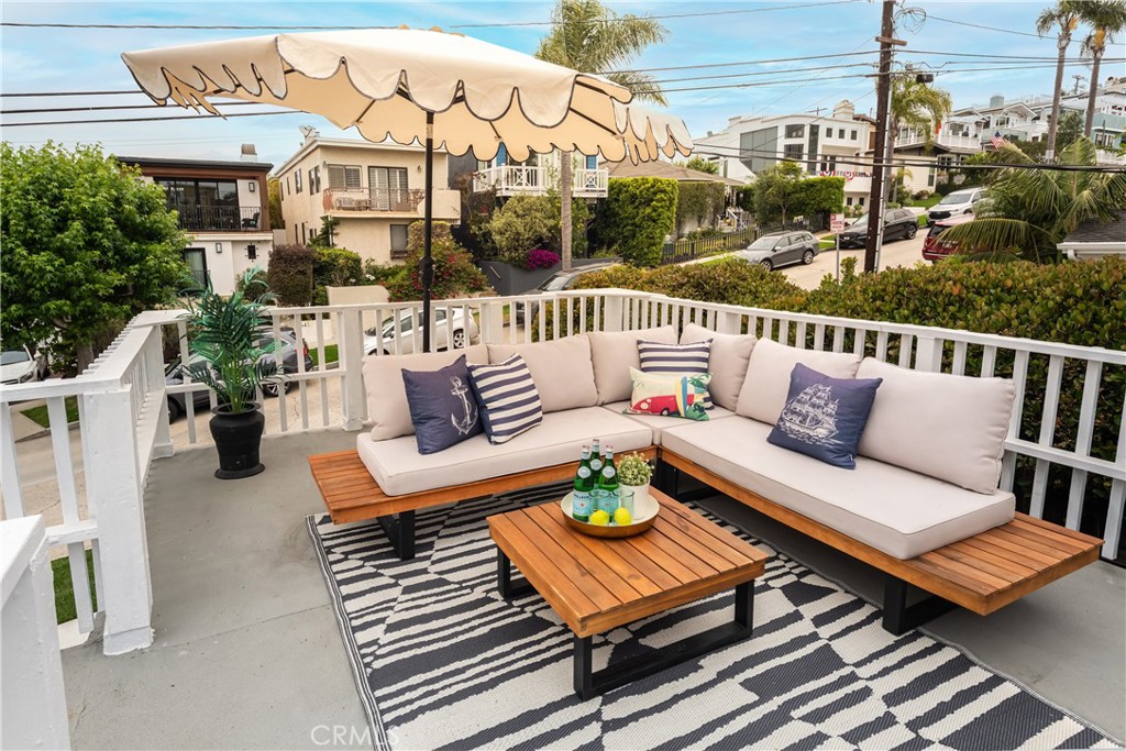 Don't miss this GEM in North Hermosa West of PCH .  Darling 3 bedroom home comes with fully approved plans for a 4 bedroom, 3 1/2 bath single family home with ocean views, roof deck, and a yard from local architect Jim Fasola.  Live in now and build later.  Skip the 1-2 year building permit process.  Or rent until you're ready to build.  Or stay here forever!  The current home offers a remodeled kitchen and bath, new flooring, spacious and grassy backyard, and an ocean view deck.  This home is absolutely darling.  Walk to the beach and greenbelt.  Ideally located halfway between the Manhattan and Hermosa Beach piers.  Enjoy Southern California Living at a reasonable price.