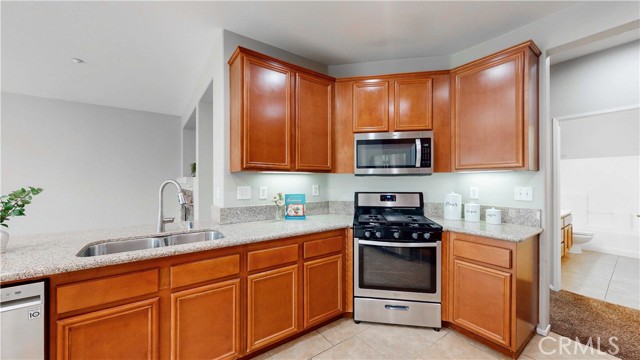 Kitchen with stainless apliances, farm sink