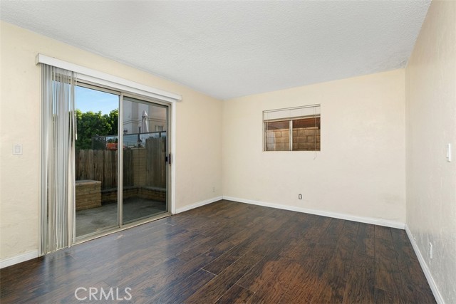 Downstairs Bedroom- Leads to the Patio