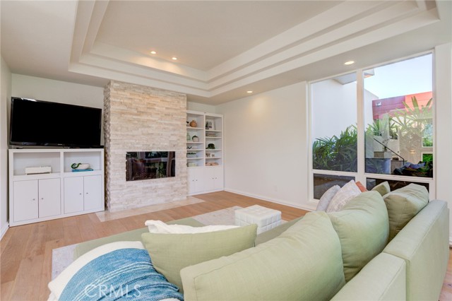 Bright Downstairs Family Room with Fireplace