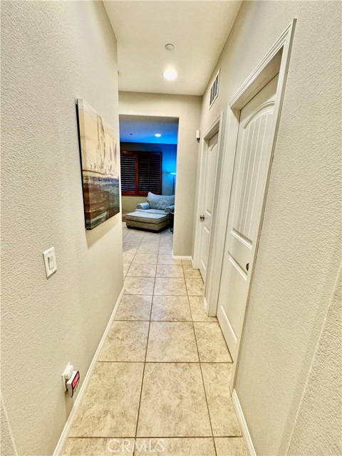 Hallway to Laundry; bathrooms 1 and 2; bonus room; bedrooms 1 and 2.