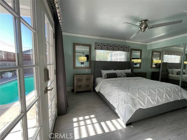 Master Bedroom with doors leading to outside pool.