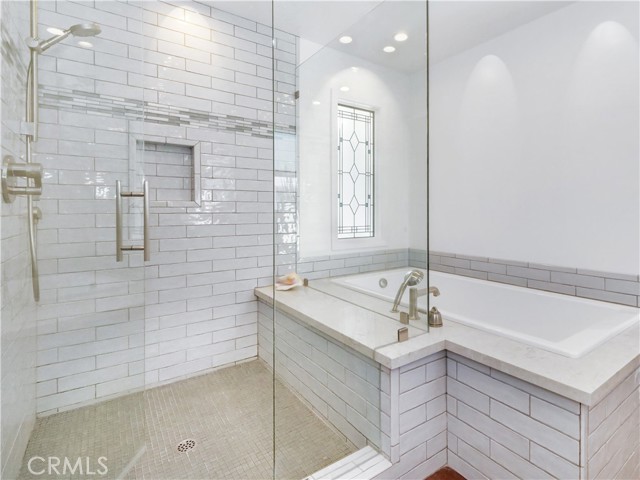 Master Bathroom with Walk-in Shower and Separate Tub