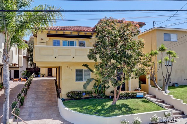 202 N Irena Avenue A Redondo Beach, California Beautiful Old World Spanish style detached home in a great location. 3 bedrooms and 2.5 baths in just over 2,000 sq ft (buyer to verify). Central A/C, newer hardwood floors, plantation shutters, surround sound system, and custom finishes throughout. Large master suite with walk in closet. Great kitchen with all of the bells and whistles that opens to a formal dining room. HUGE sunny west facing deck. A great home in a quiet and charming South Redondo neighborhood.