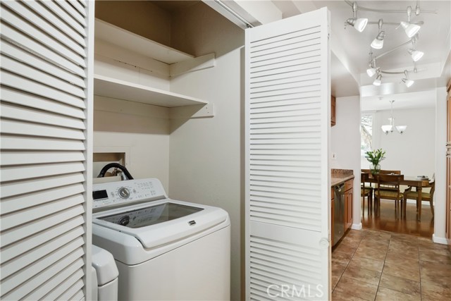 Bonus washer & dryer stay with the condo & hide behind doors