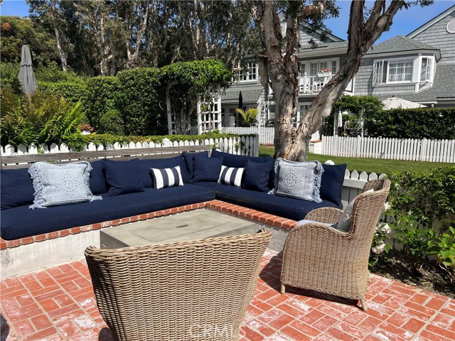 Patio complete with gas firepit.