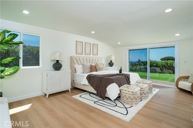 Spacious primary bedroom with ocean view. Spacious primary bedroom with ocean view.