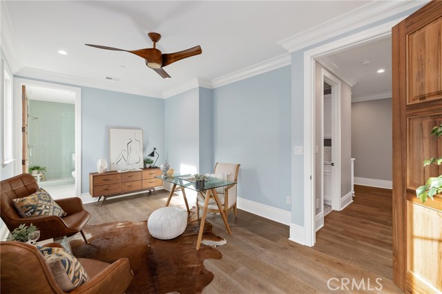 Bedroom with Full Bath and Notable Walk-In Closet. Staged Here as a Home Office