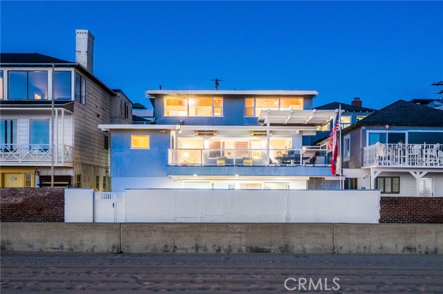 3031 The Strand Hermosa Beach, California BULLSEYE! This rare 45 x 101 lot is exactly between the HB & MB piers. The best part of the Hermosa Strand can be yours with a perfect beach house.
The extra width on the strand provides a special feeling. With the living level elevated from the strand you have great privacy while enjoying sunsets over ocean. The beach and Pacific Ocean set a perfect backdrop while looking through the open floorplan. The beach is at your feet while you lounge or dine on your large patio off the living level. Three bedrooms, each with their own bath upstairs. Two bedrooms and laundry on the main living level. Rec room, beach shower and second laundry on lower strand level. Tastefully remodeled in 2009.
With approximately 3,530 sf this house is a great retreat to celebrating life's special events with friends. All this and a huge 3+-car garage (possibly 4-cars) for all your beach toys!
