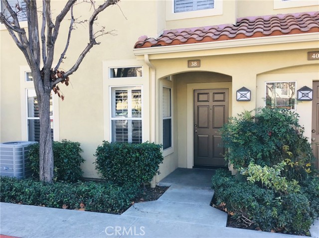 38 Camino Del Oro Rancho Santa Margarita, California This beautiful three-bedroom condominium in the Melinda Heights area of Rancho Santa Margarita offers approximately 1,500 square-feet of living space with a first-floor half-bath and two full baths and three bedrooms upstairs. The spacious kitchen leads to the family room with a fireplace and access to the back patio. The home also offers both a living room and formal dining room. The upgraded master bedroom includes a bathroom with quartz counters, and a walk-in closet. Two secondary bedrooms complete the upstairs space. There is an attached 2-car garage, as well as plenty of guest parking. A community pool and nearby parks and shopping make this an ideal location.