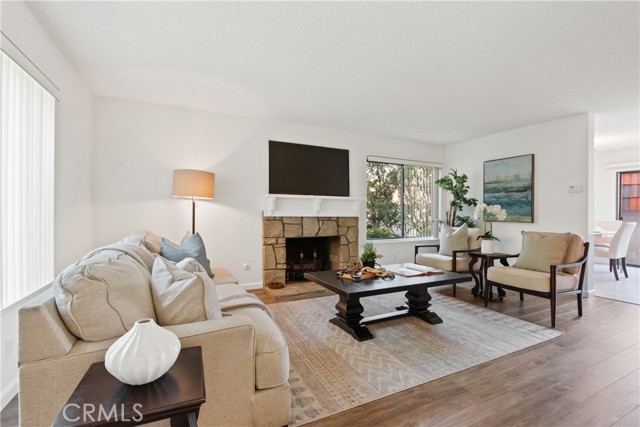 fireplace & new wood laminate floors in living room