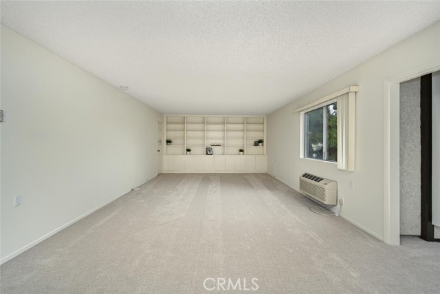 Living room with wall shelves