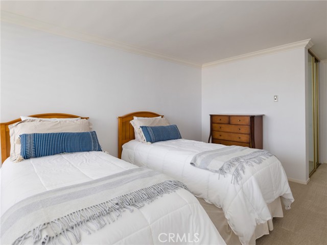 Inviting and bright second bedroom.