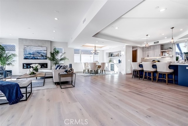 Open floor plan with stunning wide plank flooring