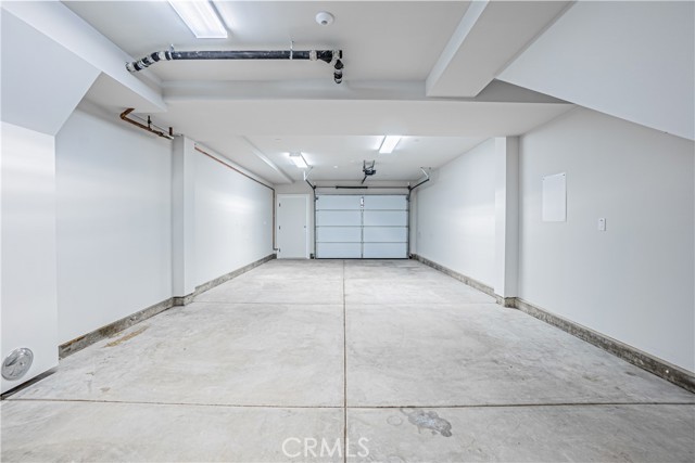 Tandem Garage with access to multi-use room.