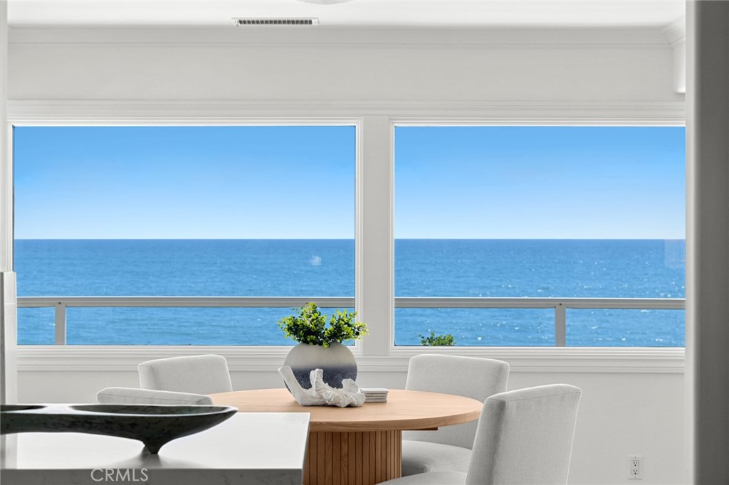 Commanding one of the most cinematic white-water views in all of San Clemente, this exceptional beachfront residence captures the entire coastline from T-Street and Lost Winds to Seal Rock, the historic SC Pier, and iconic Cottons Point. Rarely do homes offer such unobstructed, panoramic vistas from every room. Set within the gated, oceanfront community of La Ladera, this expanded 3,800+ sq ft residence rests on a prime corner lot and offers a seamless blend of refined design and effortless living. Originally remodeled prior to the current ownership, the home has since undergone further upgrades, including new Pella windows and doors, and state-of-the-art HVAC system. Thoughtfully designed for single-level living, the main floor includes the primary suite, all-new gourmet kitchen featuring top-tier appliances, living and dining areas—all with sweeping views of the Pacific. The lower level offers exceptional flexibility with two guest bedrooms, full baths, a spacious office or flex space, and direct access to a generous patio with side entrance—ideal for "lock-off" guest quarters or extended stays. A private gate leads directly to the beach and trail. Every inch of the home has been enhanced: wide-plank flooring throughout, a spa-like primary bathroom with oversized shower, new lighting and electrical systems, security, and landscaping by acclaimed MM Design. Additionally, approved and permitted architectural plans are in place to reconfigure the upstairs floor plan, offering future owners optionality without the delays of design and permitting. This turn-key residence represents a truly irreplaceable opportunity—a low-maintenance beachfront sanctuary with panoramic views, over 3,800 square feet, and a three-car garage, all within one of San Clemente’s most charming and private communities.