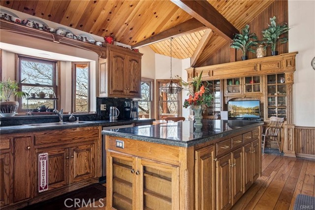Main House:Gourmet kitchen with custom island and built in China cabinet.