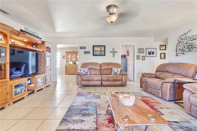 Large living room which connects to the dining and kitchen areas. Office room off the living room.