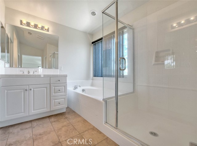 walk in shower and separate soaking tub
