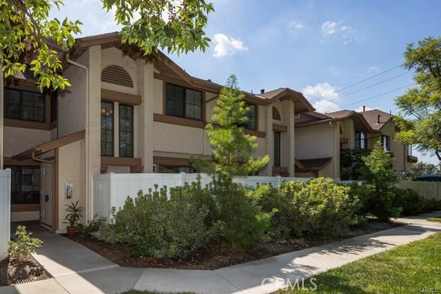 2350 Sutter Way 249 Fullerton, California This two-bedroom condo is quietly located At Back Of the complex. It is surrounded by green trees and privacy which is a quiet, delightful setting. Nice patio off the dining area for outside dining as well. Remodeled kitchen, Laminate wood floor, Recessed lighting throughout house. The unit is 2-story with 2 master bedrooms upstairs, each with its own full bathroom and 1/2 bath on down stairs. The bigger master bedroom suite has cathedral ceilings and mirrored wardrobe. Inside laundry. 2-car detached garage, and plenty of visitor parking. The complex has an association fee that covers the trash, water, roof and has 2 pools and 2 spas. This Is A Rare Find in a great area of Fullerton.