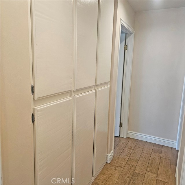 Plenty of linen cabinets in hallway for storage