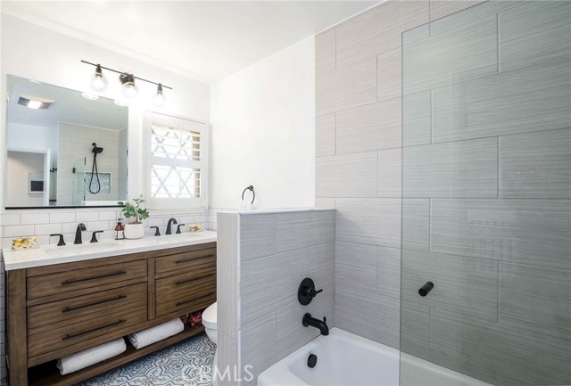 Room for the whole family in this hall bathroom... double sinks...and more!
