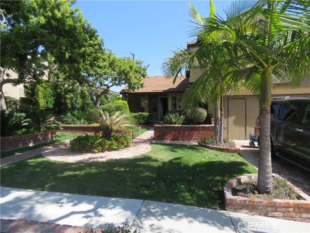 5511 Halison Torrance, California This beautiful 3 bedroom, 3 bath home comes with an office space, and a Mother-in-law suite on the 2nd level. Look onto the lusciously landscaped backyard or glance at the Torrance Little League Park from the deck as you feel the cool ocean breeze. The kitchen comes with a walk in pantry and a breakfast nook for casual eating. Kitchen opens up to the family room, boasting a brick fireplace, with direct access onto the backyard. The upstairs also offers beautiful views. Additional amenities to this home is a 2 car garage, washer, dryer, with plenty of storage space. Close proximity to West High School.