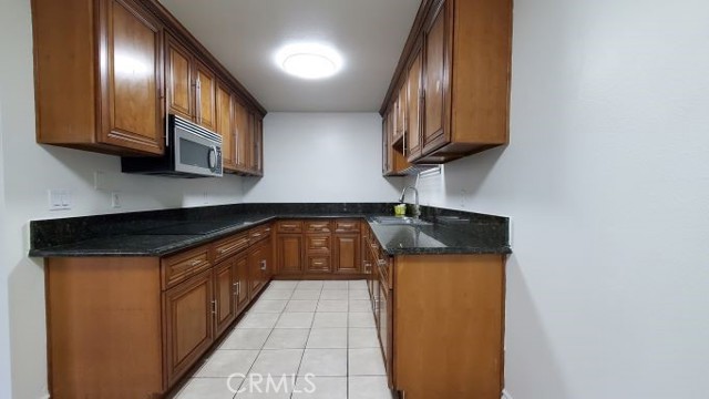 Kitchen with upgraded tile flooring
