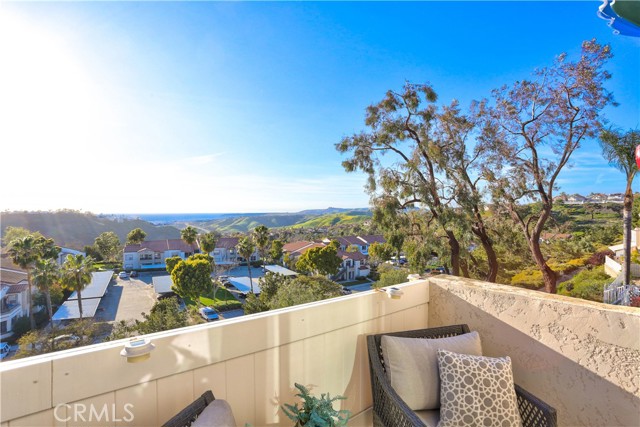 From the master bedroom balcony you can see the Pacific Ocean, Catalina Island, Dana Point Harbor, city lights and hills.