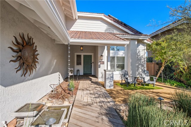 Out front seating is a cozy addition to this recently painted home!