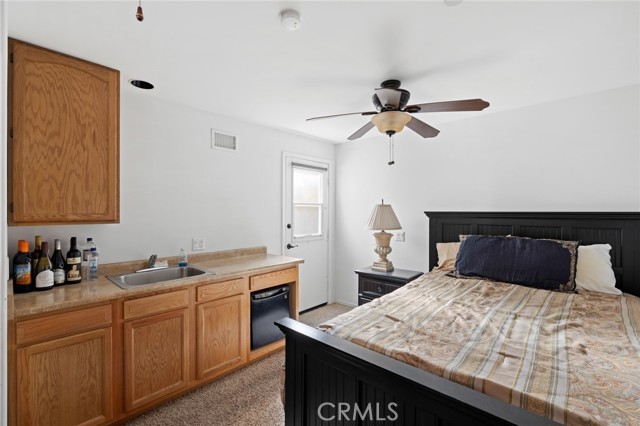 336 Y - Lower unit including a versatile guest room with separate entrance and kitchenette.