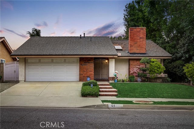 64 Village Loop Road Pomona, California Perfectly Perfect in highly desirable Philips Ranch. This beautifully maintained 3 bedroom 2 bath home is sure to delight with so many lovely features. Tile floors, beautifully upgraded kitchen with high end finishes and greenhouse window looking out into the yard is a true gardener's delight. Tall ceilings, sunken living room, and skylights provide natural light and make the home feel nice and airy. A spacious and grand master bedroom with closet space galore and a master bath fit for royalty opens up to the yard providing indoor/outdoor living from various areas in the home. A tranquil oasis perfect for lazy Sunday afternoons outdoors and tons of living space indoors. All this located just minutes from shopping, restaurants, and freeway access to 60, 10,57,71 and the 210 is a true commuter's delight. Newer furnace and AC. This home is turnkey and will not last long.