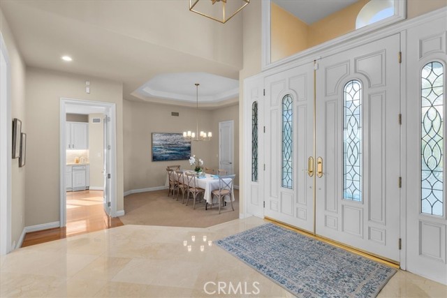 Foyer view towards dining room and kitchen